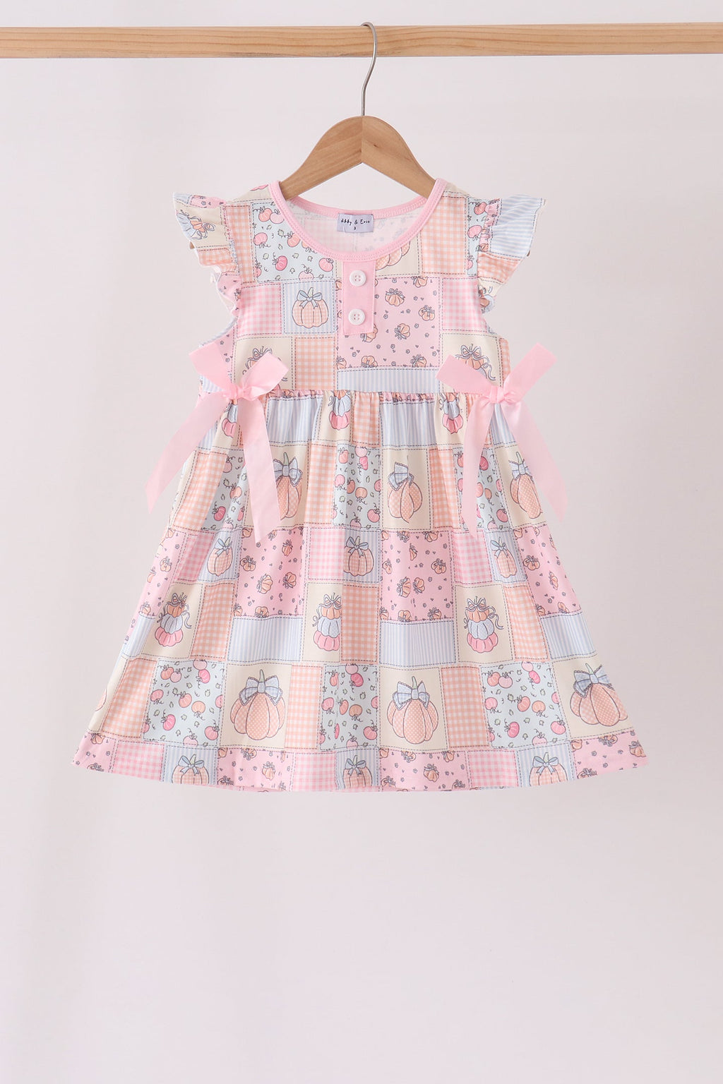 Pink pumpkin print ruffle dress