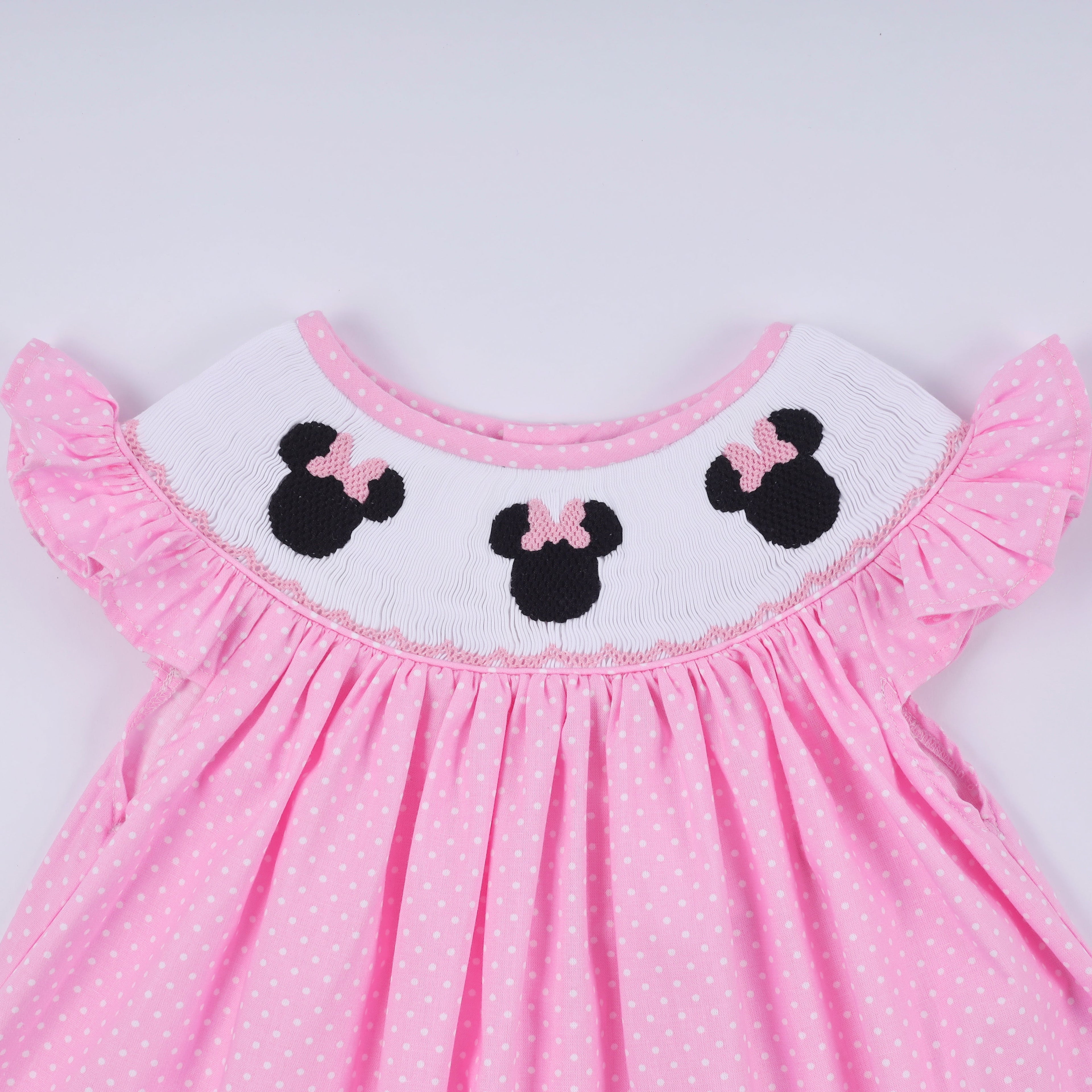 Pink character hand smocked dot ruffle pants set